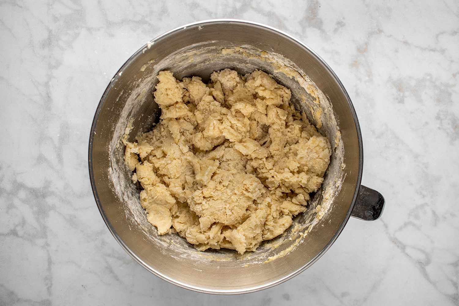Potato dough mixture in a mixing bowl