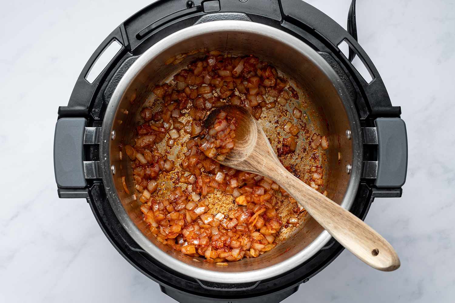 Onions and spices in an Instant pot