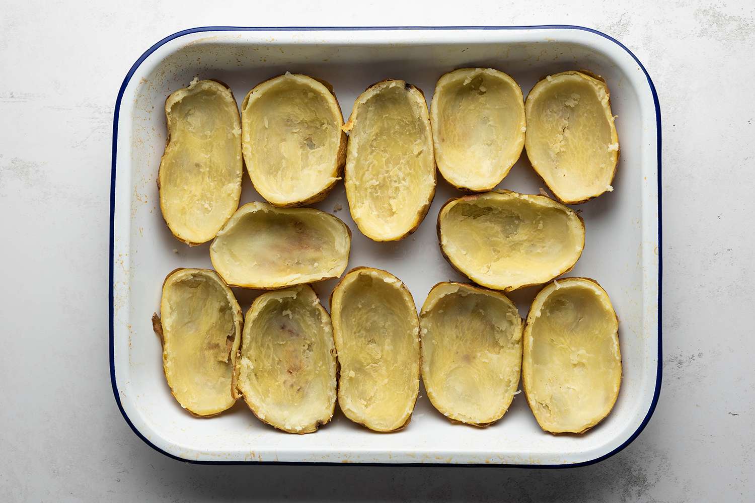 Potato skins in a baking dish 