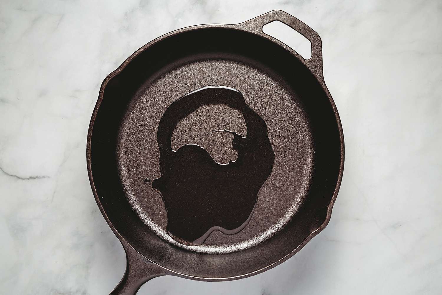 Cast iron pan with oil 