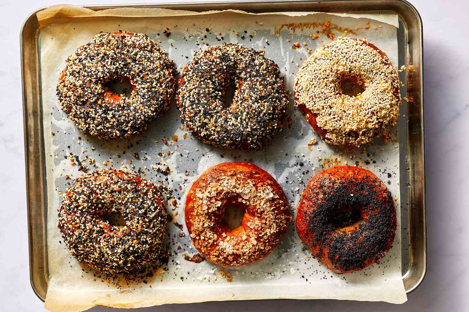 Baked bagels on a baking sheet 