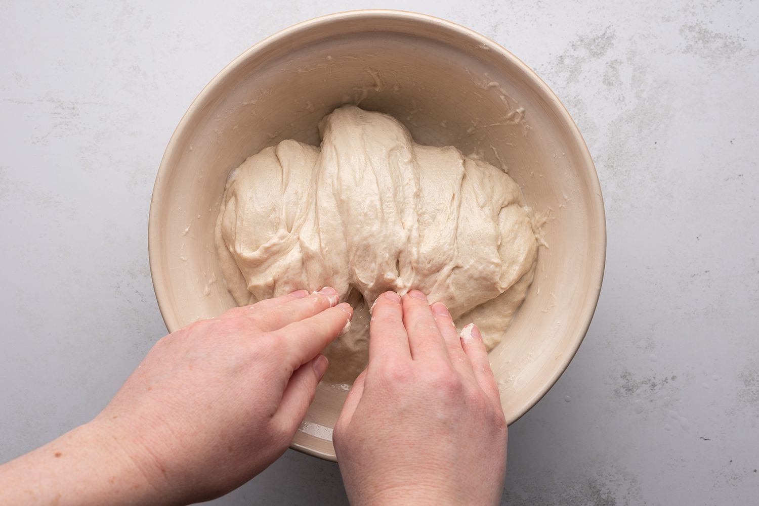 Dough in a bowl, stretched and folded 