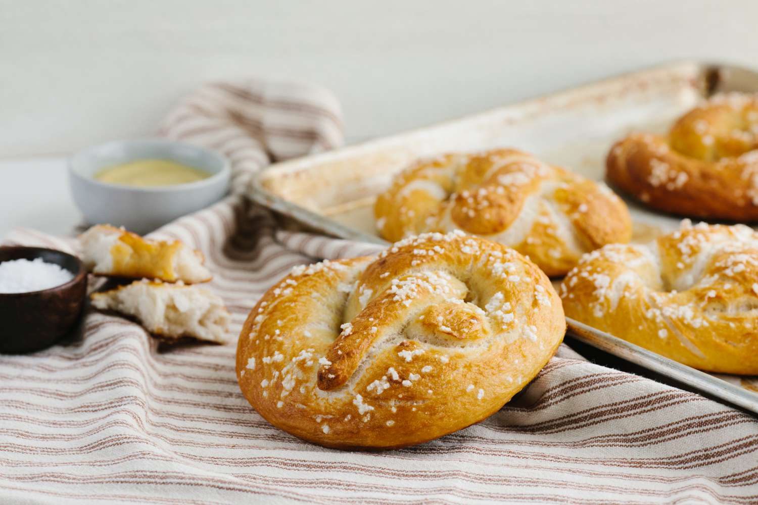 sourdough pretzels on a baking sheet