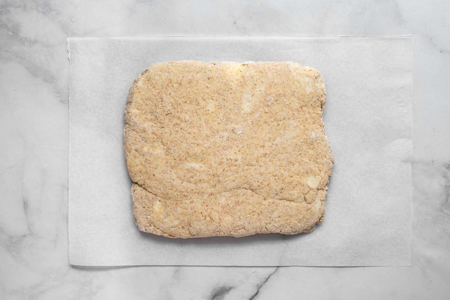 biscuit dough on parchment paper 
