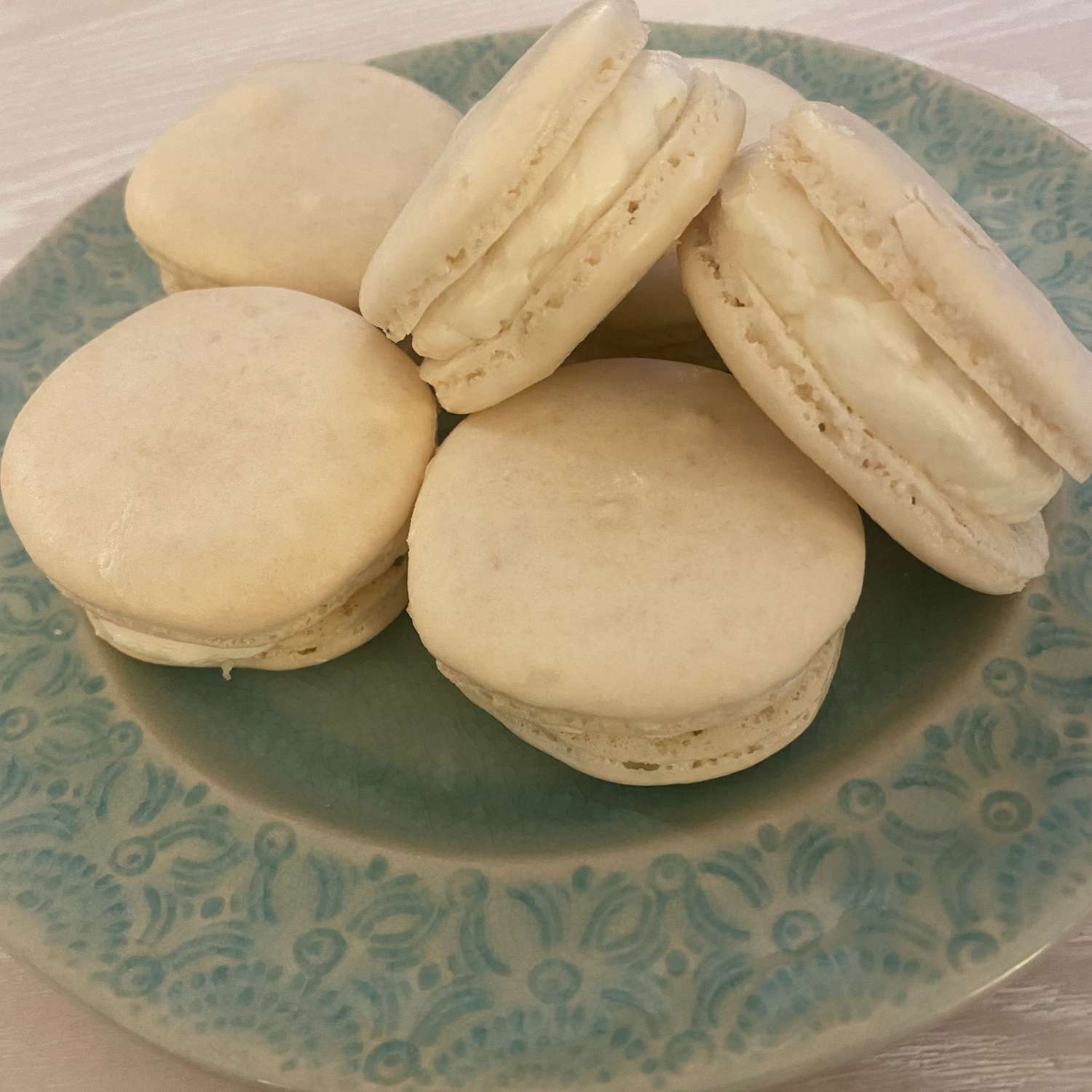 French macarons on a blue plate