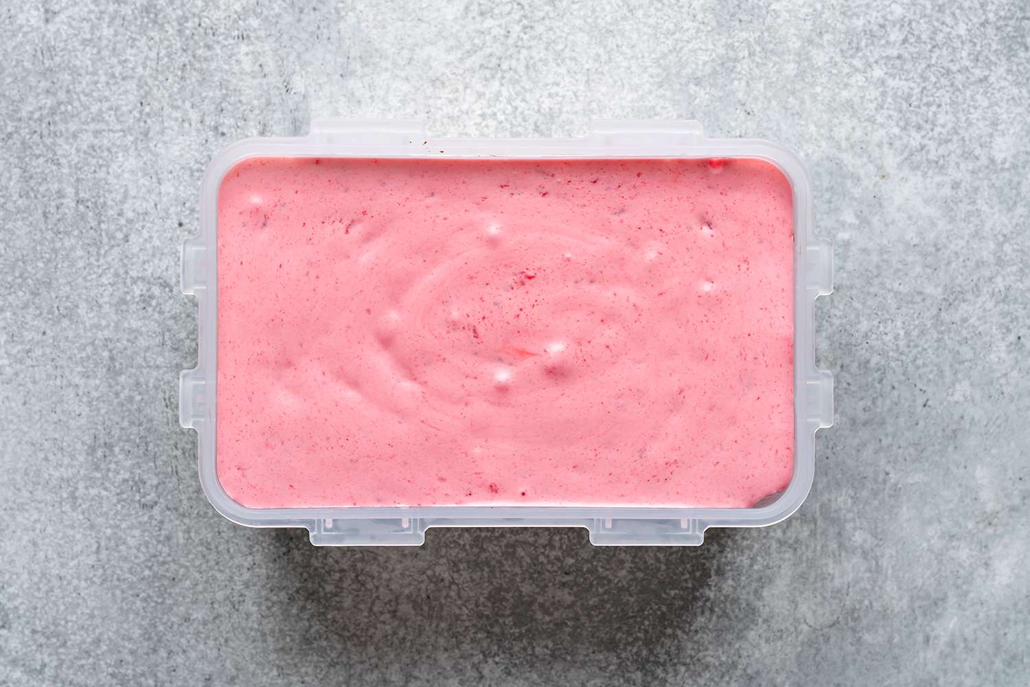 strawberry ice cream in a rectangular container
