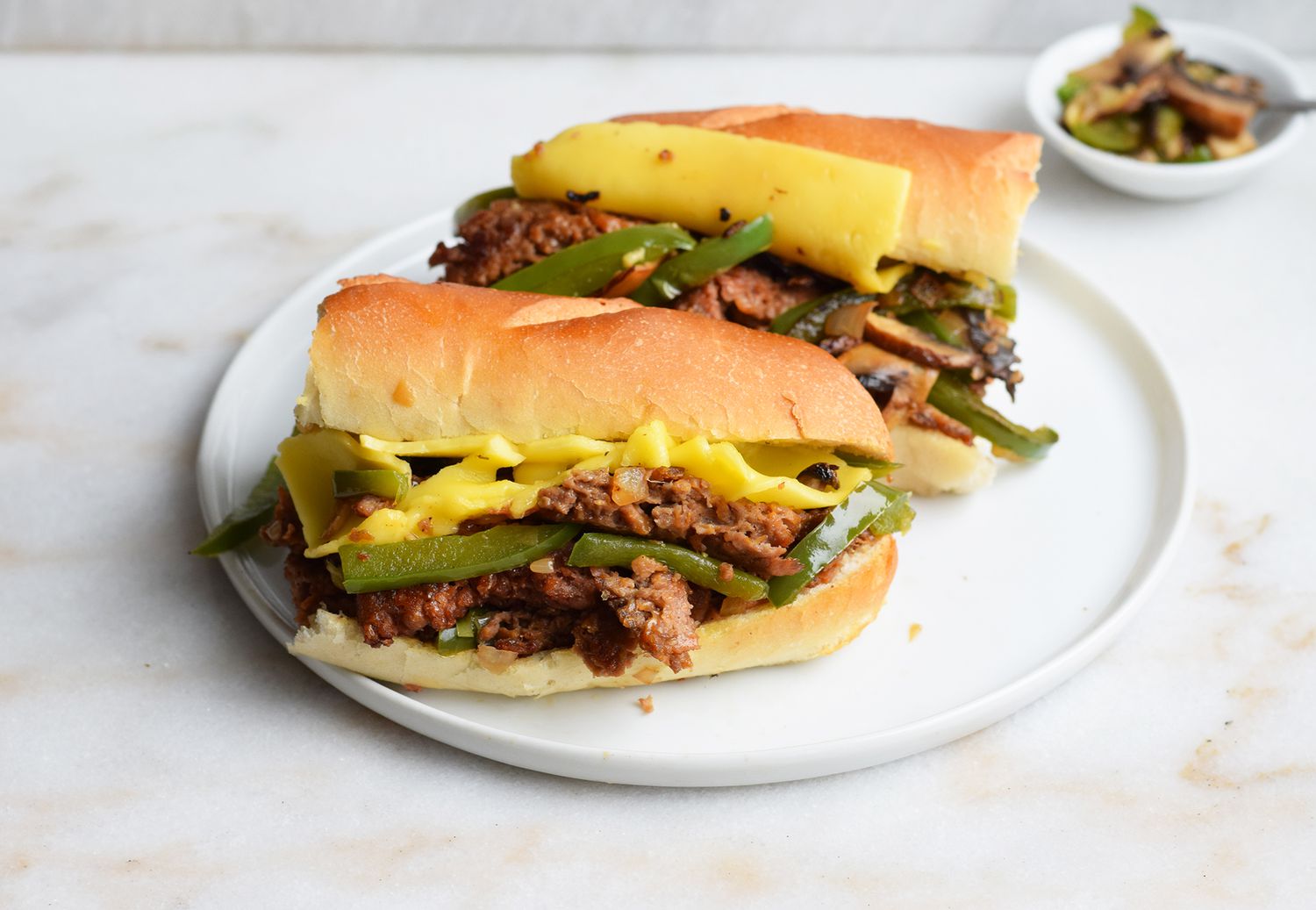 beyond meat Philly cheesesteak on a roll
