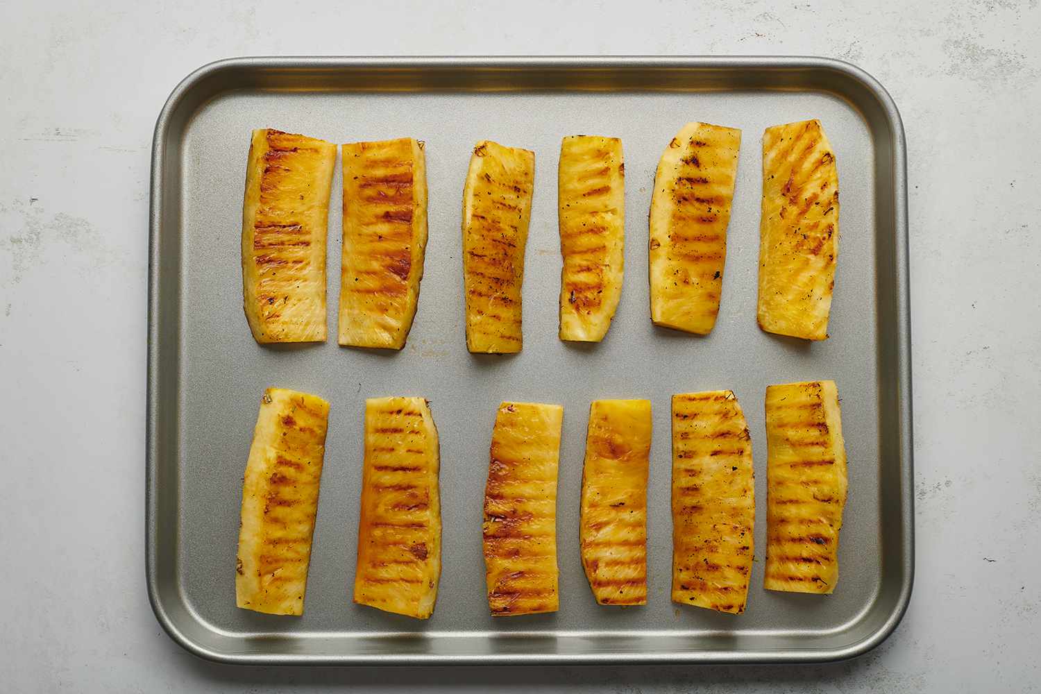 Grilled Pineapple on a baking sheet 