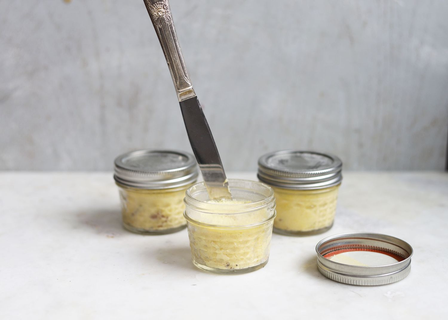 using knife around the edge of sous vide egg bites in jars