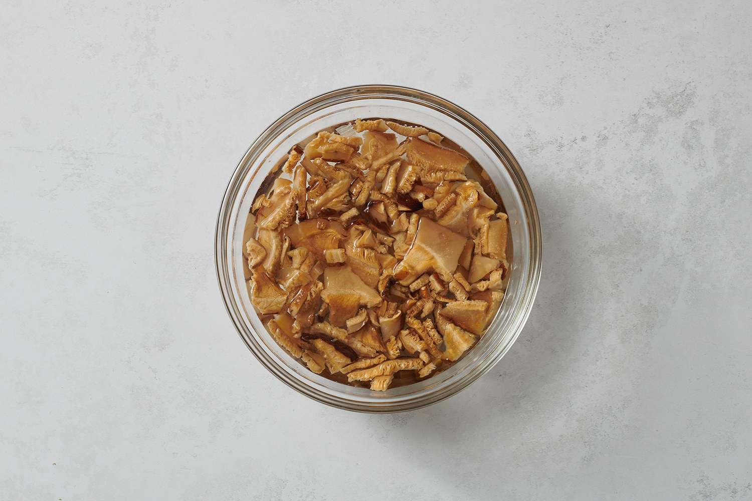 Dried mushrooms in a bowl of water