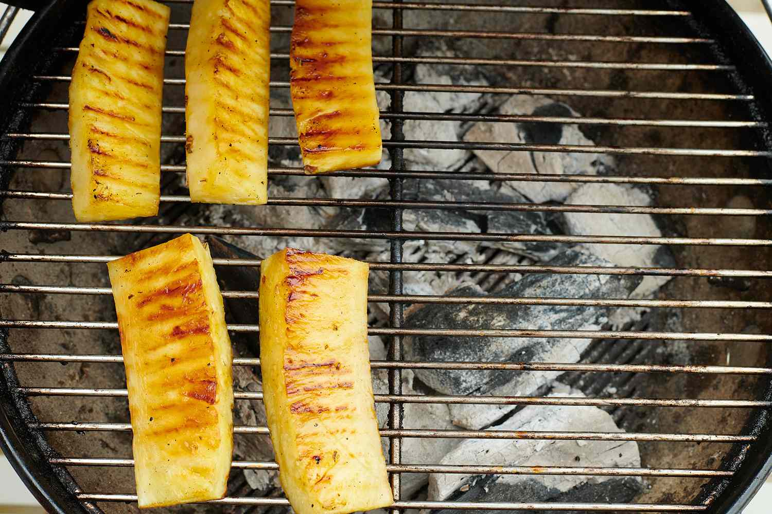 Pineapple slices on a grill 